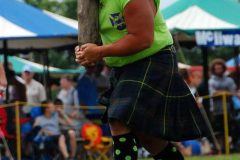 An athlete competing in the Highland Games on Grandfather Mountain in July